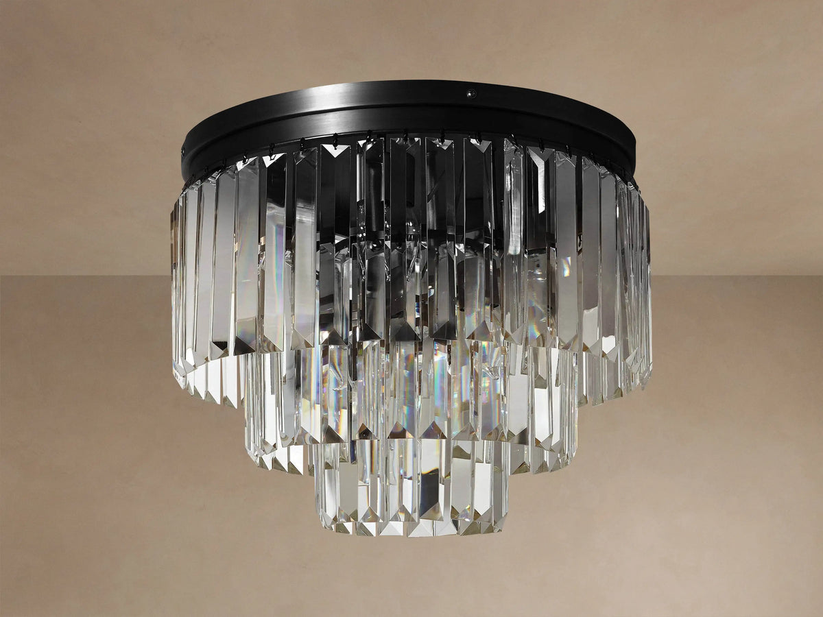 Leyland Flush Mount with tiered clear K9 crystal prisms and black oil-rubbed iron frame, illuminated on a light ceiling.