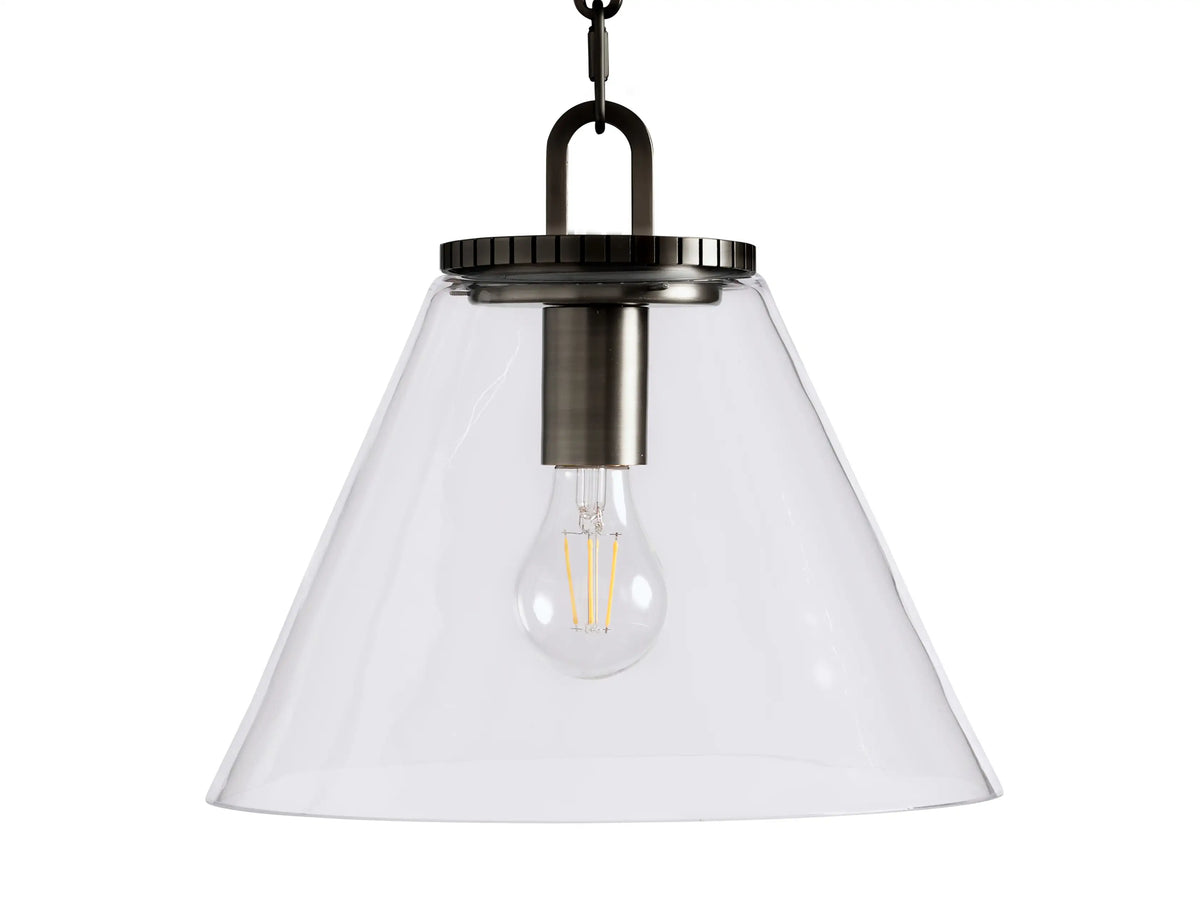 The Wescott Cone Pendant features a clear glass cone shade with a visible bulb inside, a bronze finish at the top, and a hanging chain.