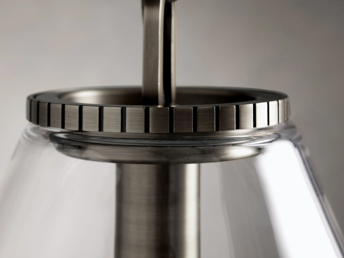 Close-up of the Wescott Cone Pendant focusing on the steel fixture with a bronze finish, showcasing the clear glass cone shade.