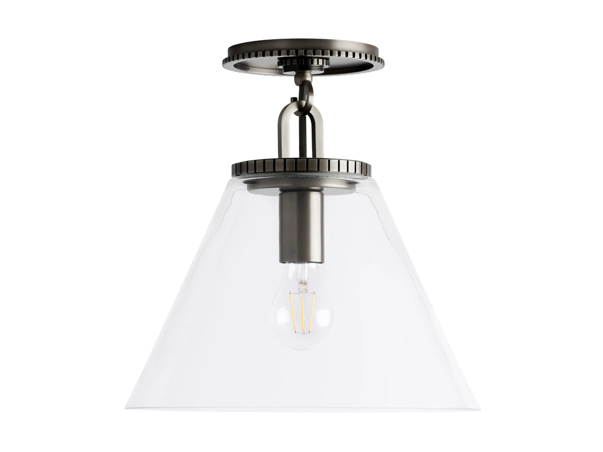 Wescott Cone Flush Mount with clear glass cone shade, visible bulb, and a metallic fixture against a gray ceiling.