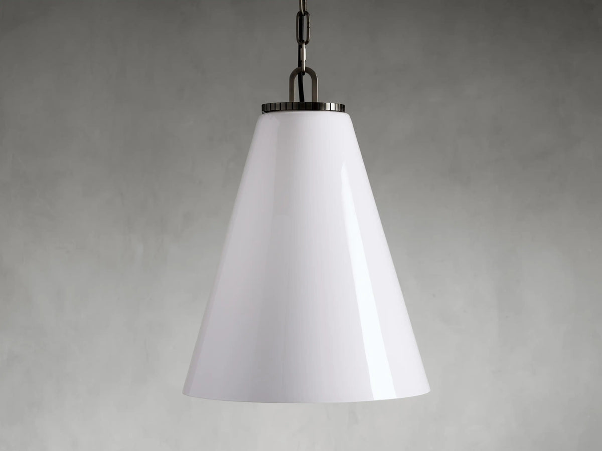 Wescott Cone Pendant with Chain features a white milk glass cone shade, hanging from a brass chain set against a grey background.