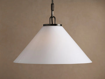 Wescott Cone Pendant: White milk glass cone shade suspended by a dark metal chain on a neutral brown background.