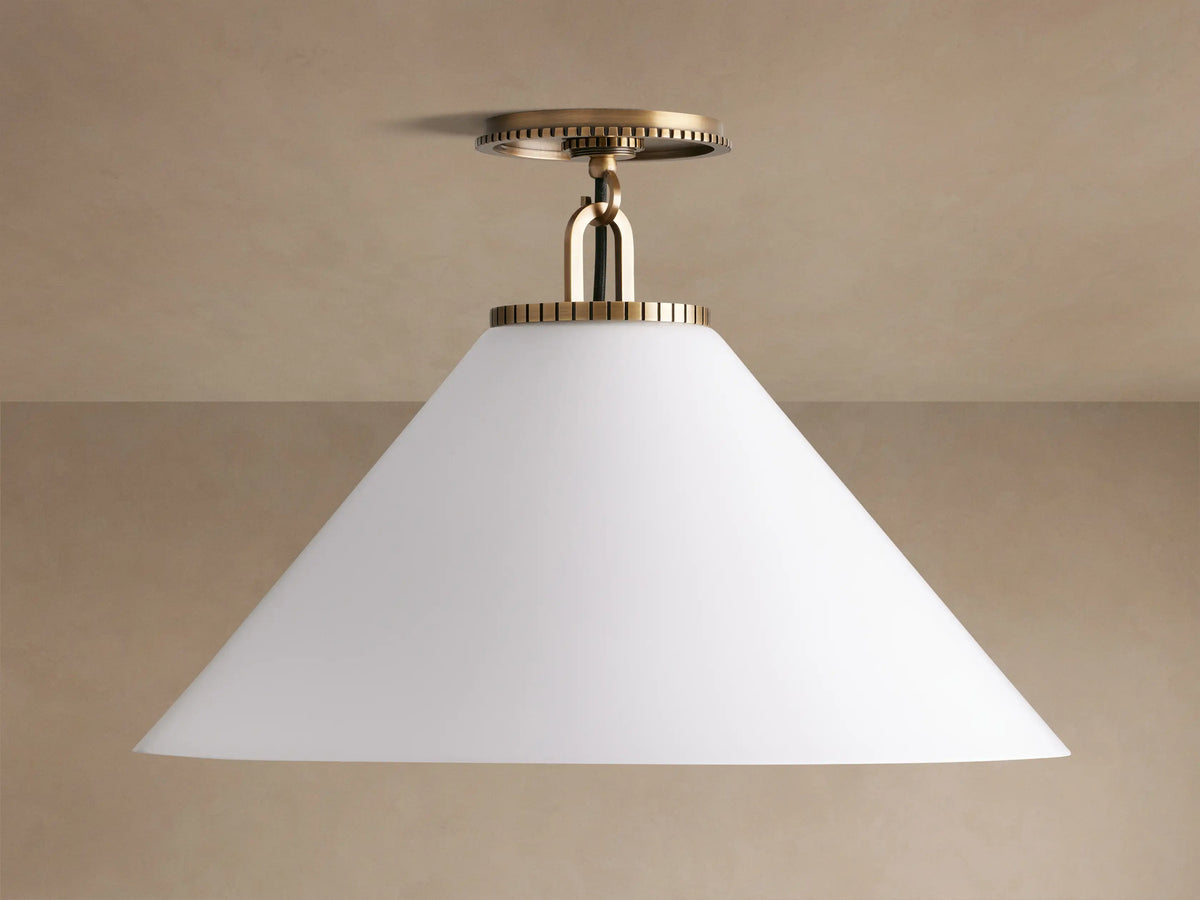 Wescott Cone Flush Mount: Brass flush mount light with ribbed detail, white milk glass cone shade, mounted on a beige ceiling.