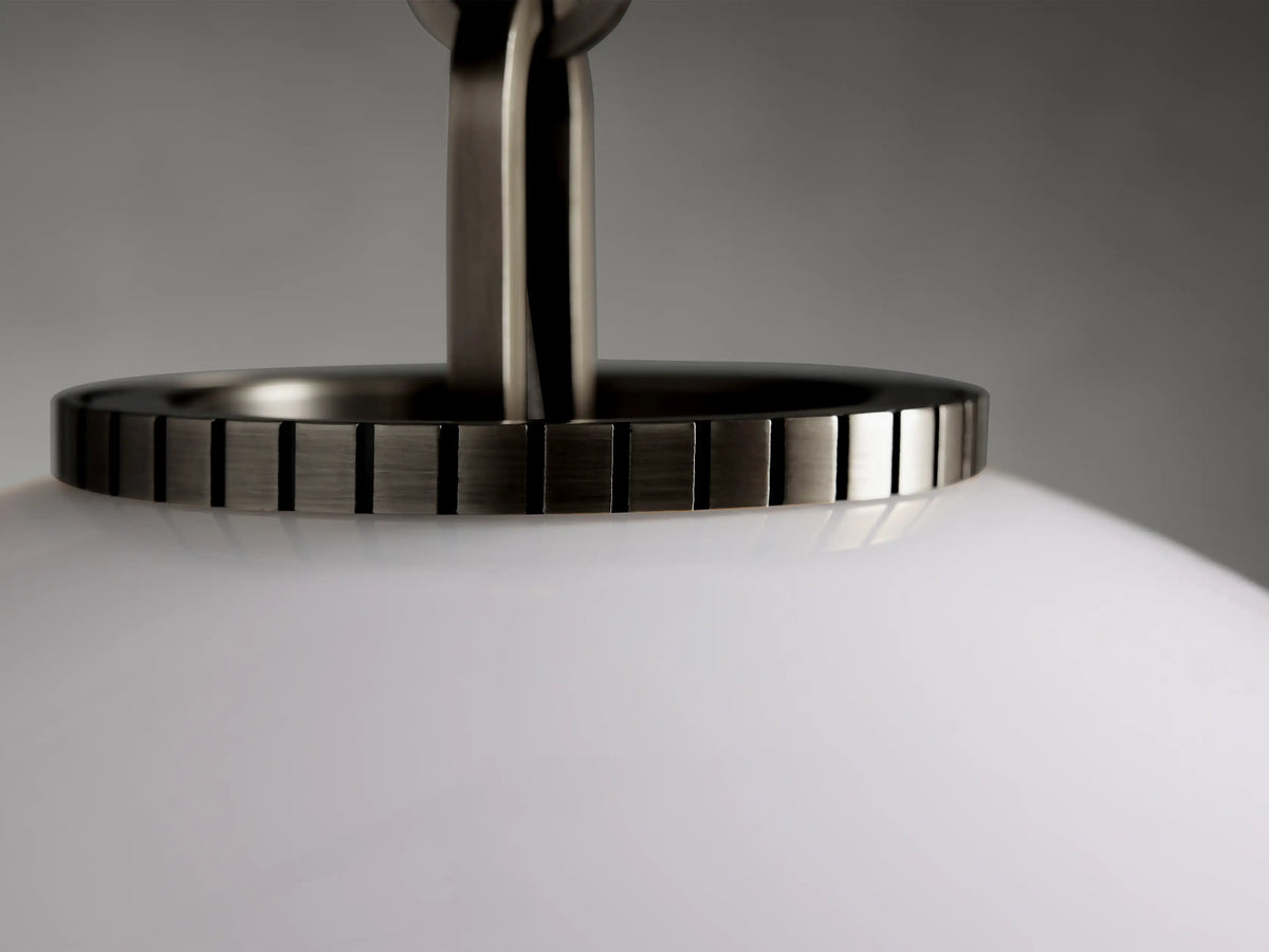 Alt text: Wescott XL Globe Pendant with Rod featuring a large, smooth milk glass globe hanging from a metallic rod against a gray background.