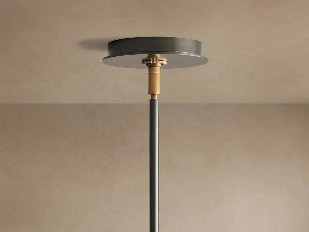 Daphne Fabric Round Chandelier showing white linen shades with black trim, light wood supports, and dark metal arms.