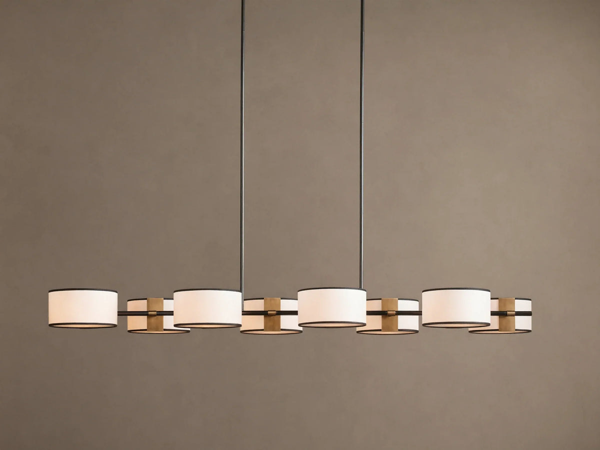 Daphne Fabric Linear Chandelier with 6 white fabric shades, black trim, and gold accents, hanging from two dark rods.