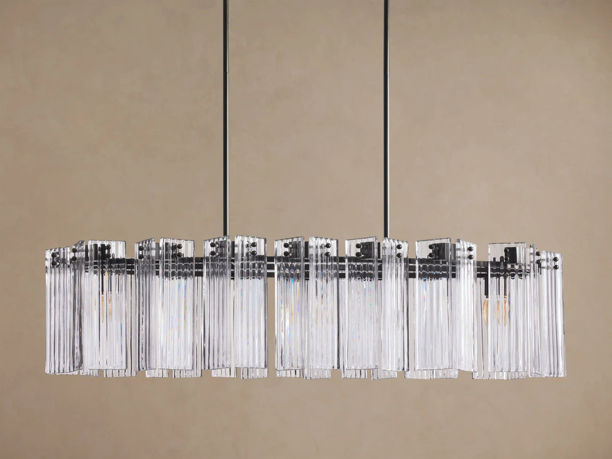 Delsie Oval Chandelier with clear rectangular glass rods and dark bronze metal frame, hanging from two black rods.