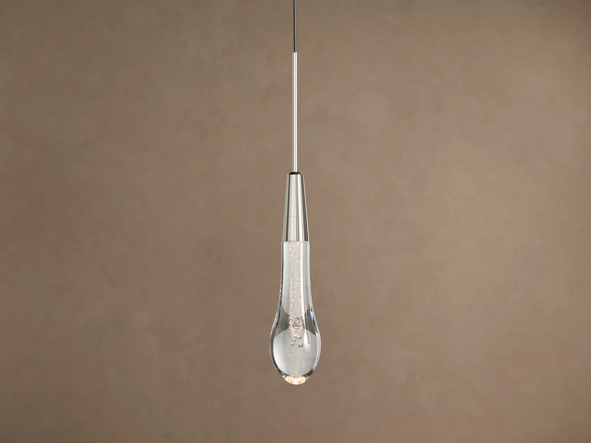 Soltaire Pendant, a nickel-finished cylinder above a clear glass teardrop with sparkling bubbles and a warm LED glow.