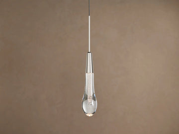 Soltaire Pendant, a nickel-finished cylinder above a clear glass teardrop with sparkling bubbles and a warm LED glow.