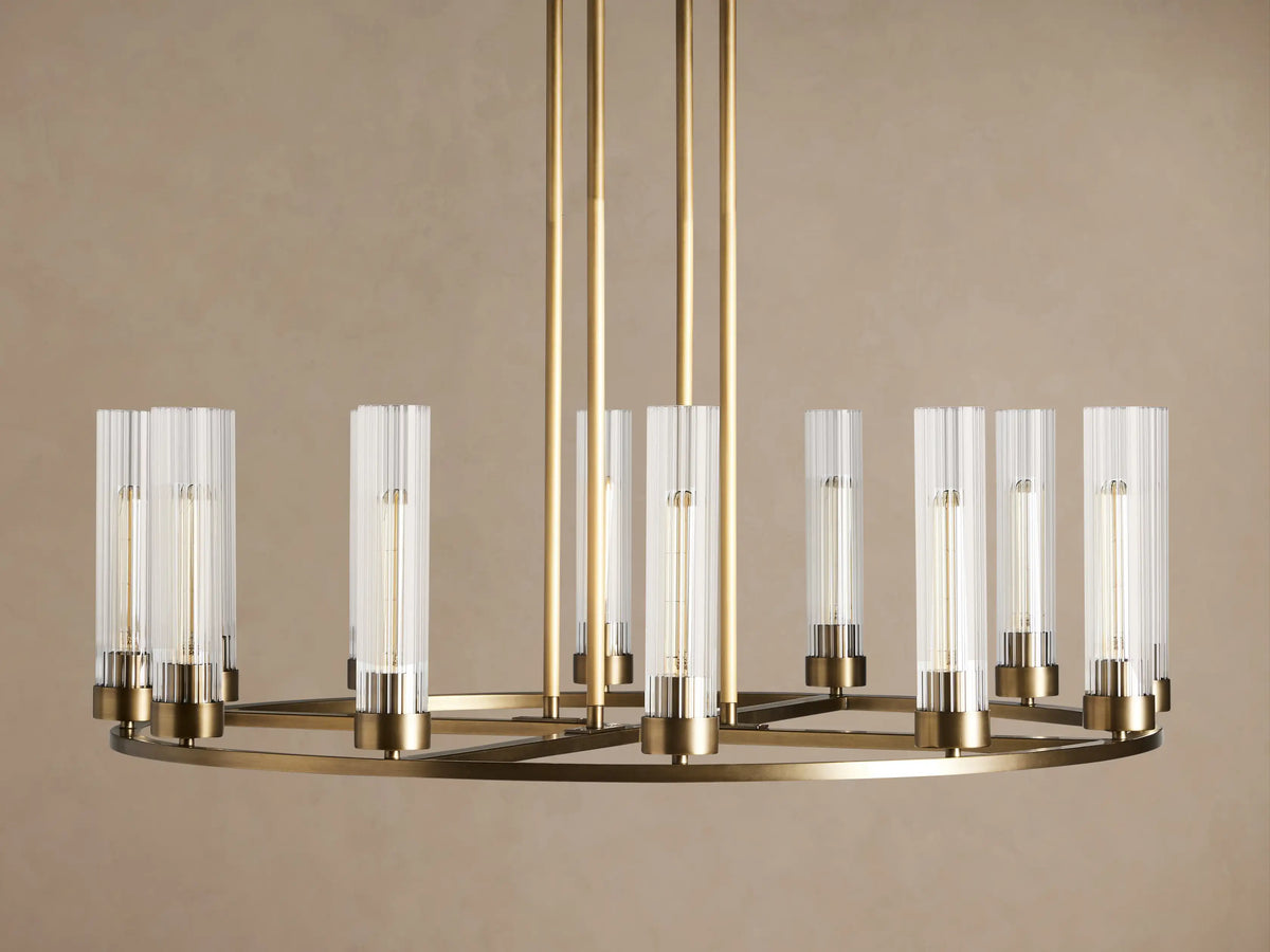 Andreas Round Chandelier, 10-light, in a plated-brass finish, with clear fluted glass cylinders & exposed filament bulbs.
