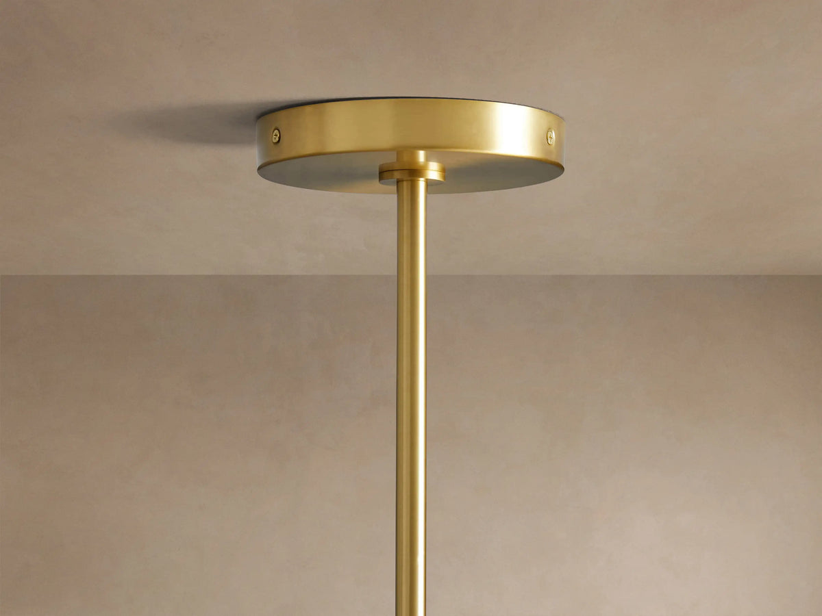 Organic 16" Pendant: Clear, bell-shaped, bubble-textured glass shade with a brass fixture and an exposed filament bulb.