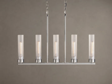 Andreas Linear Chandelier, 5-light, with ribbed clear glass shades, filament bulbs, & polished chrome finish, hanging straight-on.