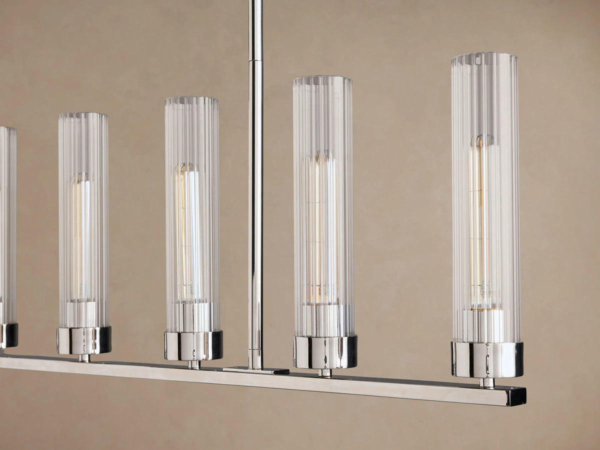 Andreas Linear Chandelier, 8-light, silver/chrome finish with clear glass cylindrical shades, suspended by chains against a neutral background.