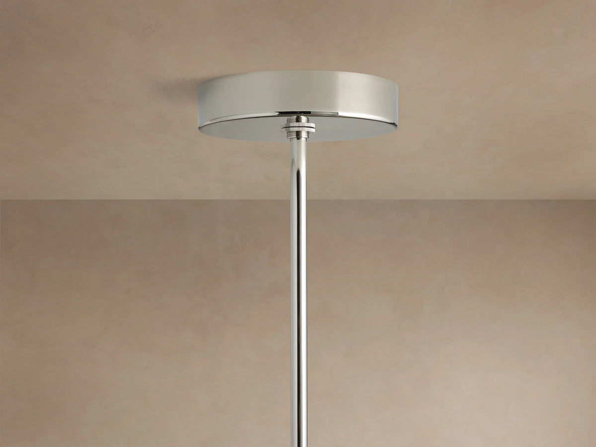 Mandoza Chandelier: Close-up of multiple lit, handcrafted clear glass globes with air bubbles on polished nickel hardware.