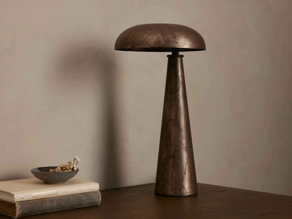 Chantou Table Lamp, antiqued brown, copper & pewter finish, mushroom shade & conical base, casting warm light.