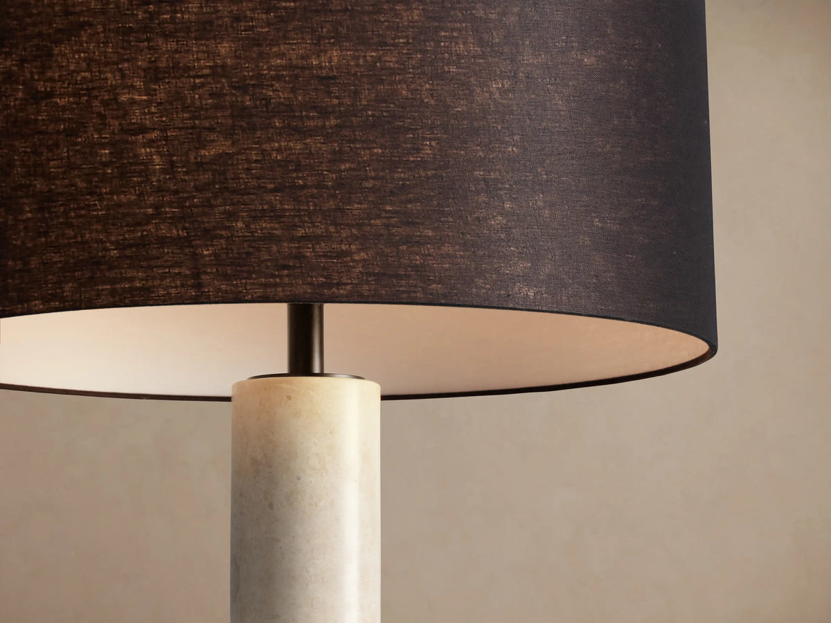 Brixton Floor Lamp: tall, mottled light marble cylindrical stand, black steel round base, and a black fabric drum shade.