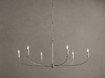 Arnett Round Chandelier. Antiqued silver finish iron frame, 6 candelabra bulbs on curved arms, hanging from chain.