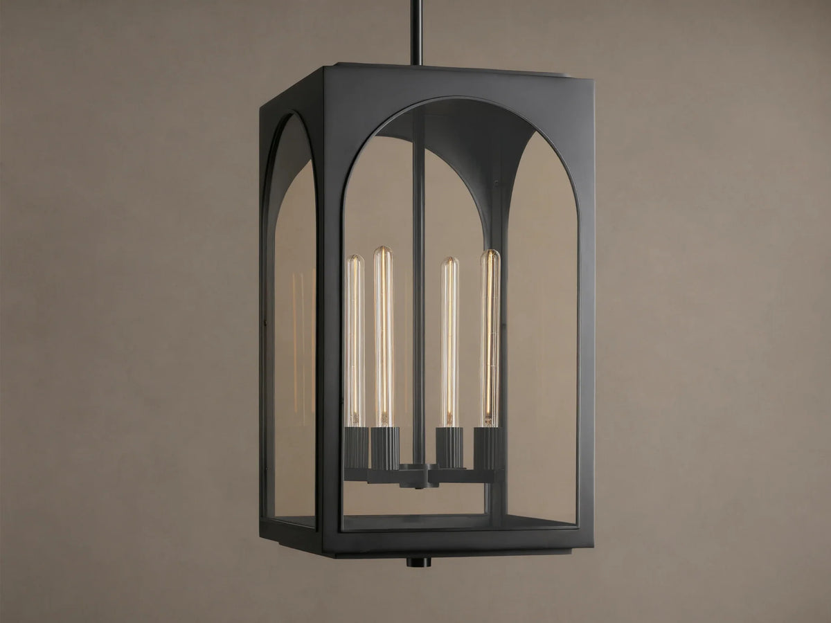 Black Palladian Outdoor Pendant, rectangular lantern with arched clear glass panels, displaying four tubular bulbs, hanging from above.