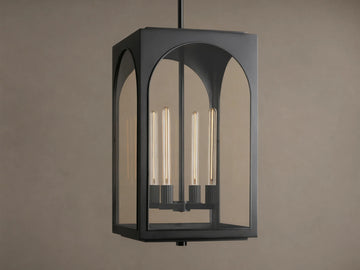 Black Palladian Outdoor Pendant, rectangular lantern with arched clear glass panels, displaying four tubular bulbs, hanging from above.
