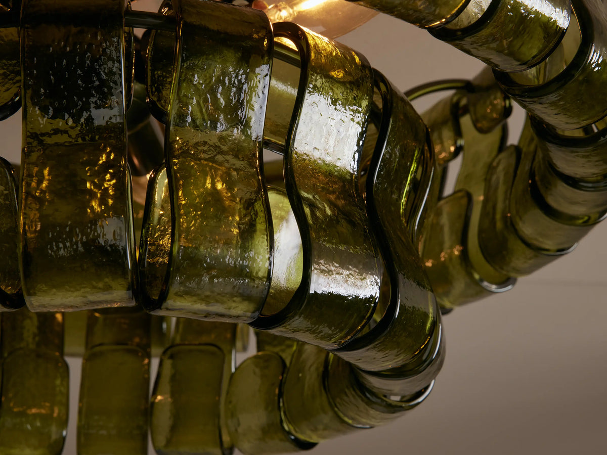 Olive green Ghiaccio Flush Mount light, textured curved glass arranged in two layers, against a light ceiling.
