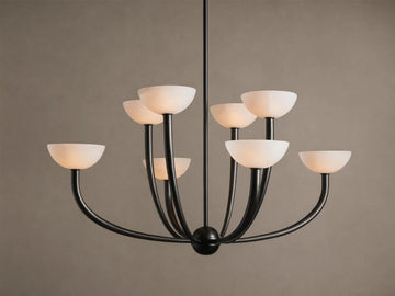Saguaro Chandelier, black metal frame with eight glowing, upward-facing alabaster bowl shades.