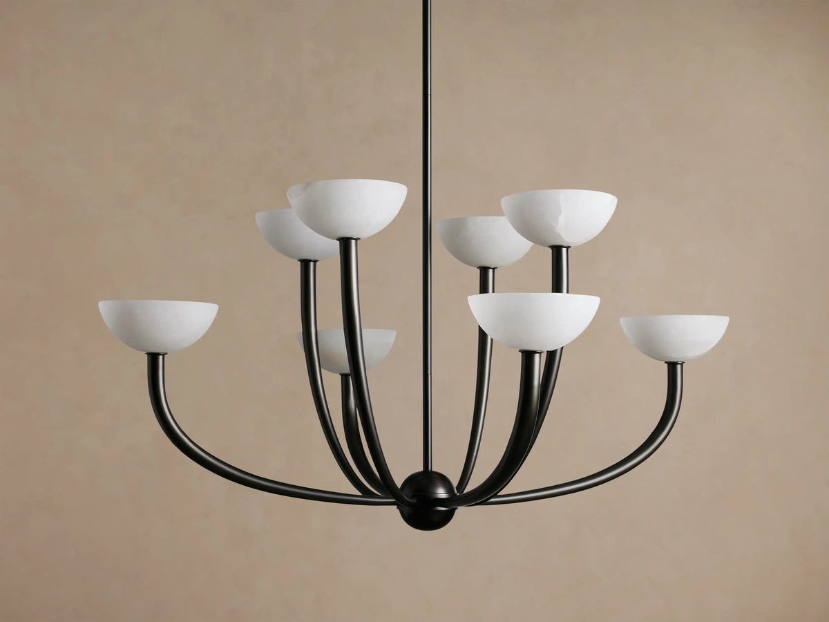 Saguaro Chandelier, black metal frame with eight glowing, upward-facing alabaster bowl shades.
