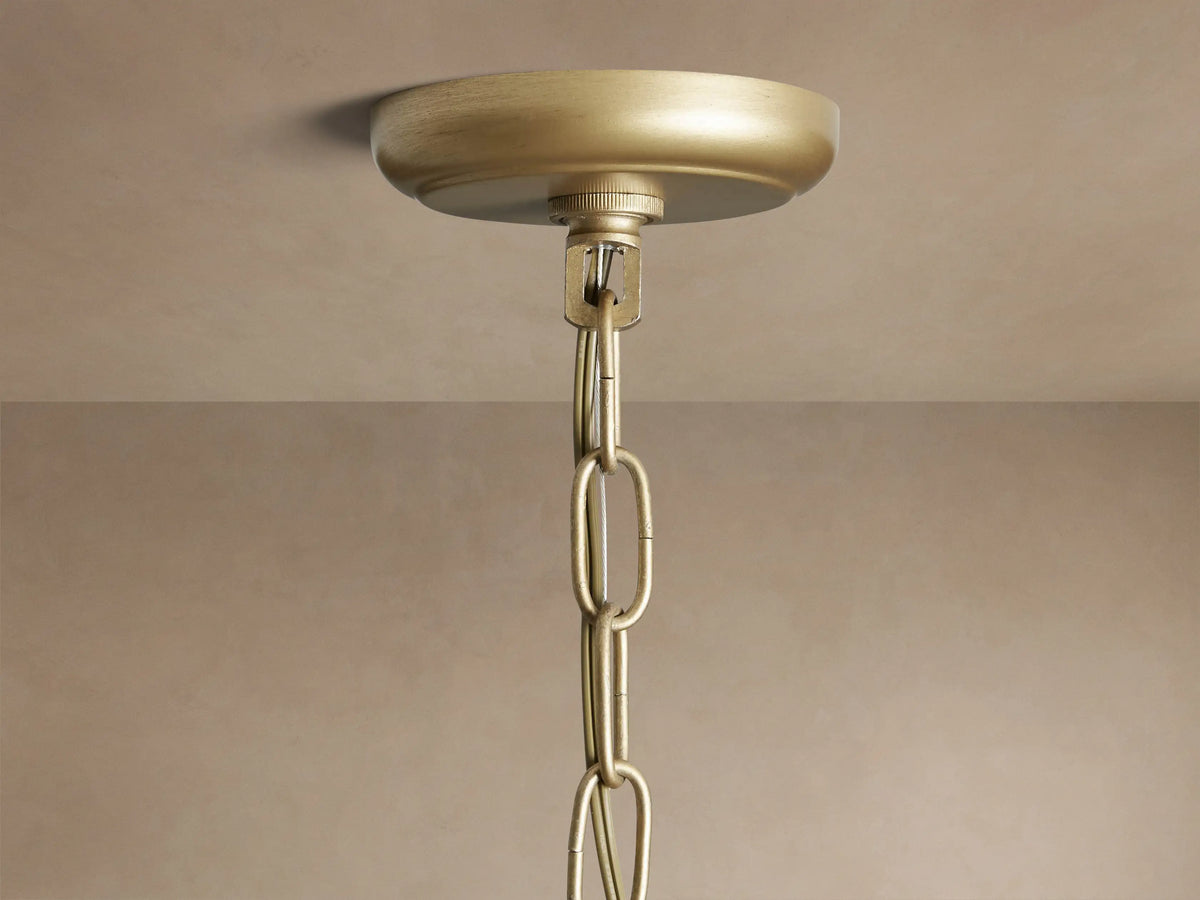 Round Leyland Chandelier with clear K9 faceted crystals hanging from an oil-rubbed bronze frame, showing rainbow refractions.
