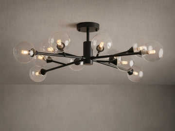 Apollo Flush Mount with an antiqued bronze finish, features multiple clear glass globes extending from a central fixture, mounted on a ceiling.