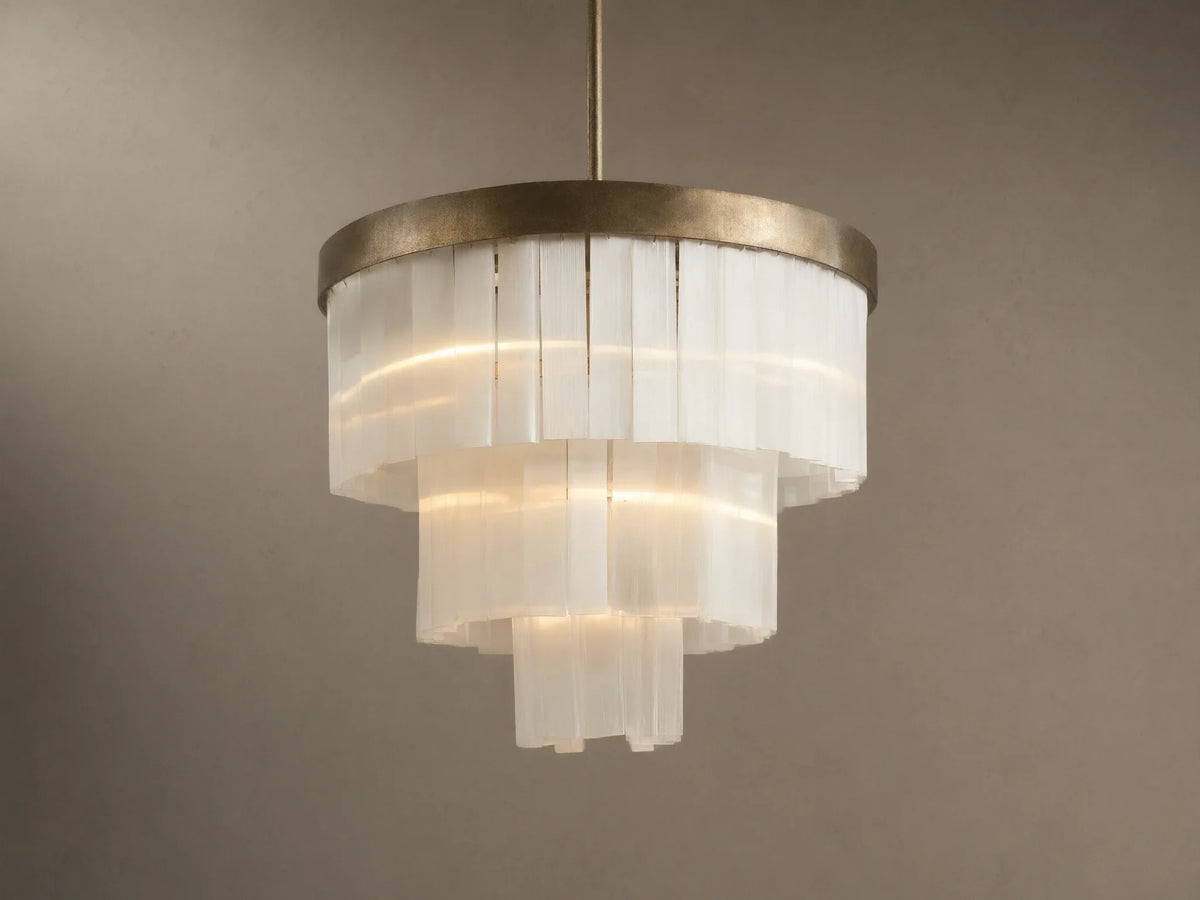 Cameron Round Chandelier: an antique silver ring tops tiered, translucent white selenite panels, emitting a warm glow.