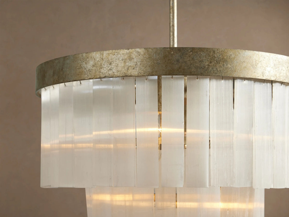 Cameron Round Chandelier with an antique silver top, cascading tiers of rectangular white selenite pieces.