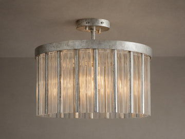 Andalucia Flush Mount with distressed silver finish, clear fluted glass rods, mounted flush on a light ceiling.