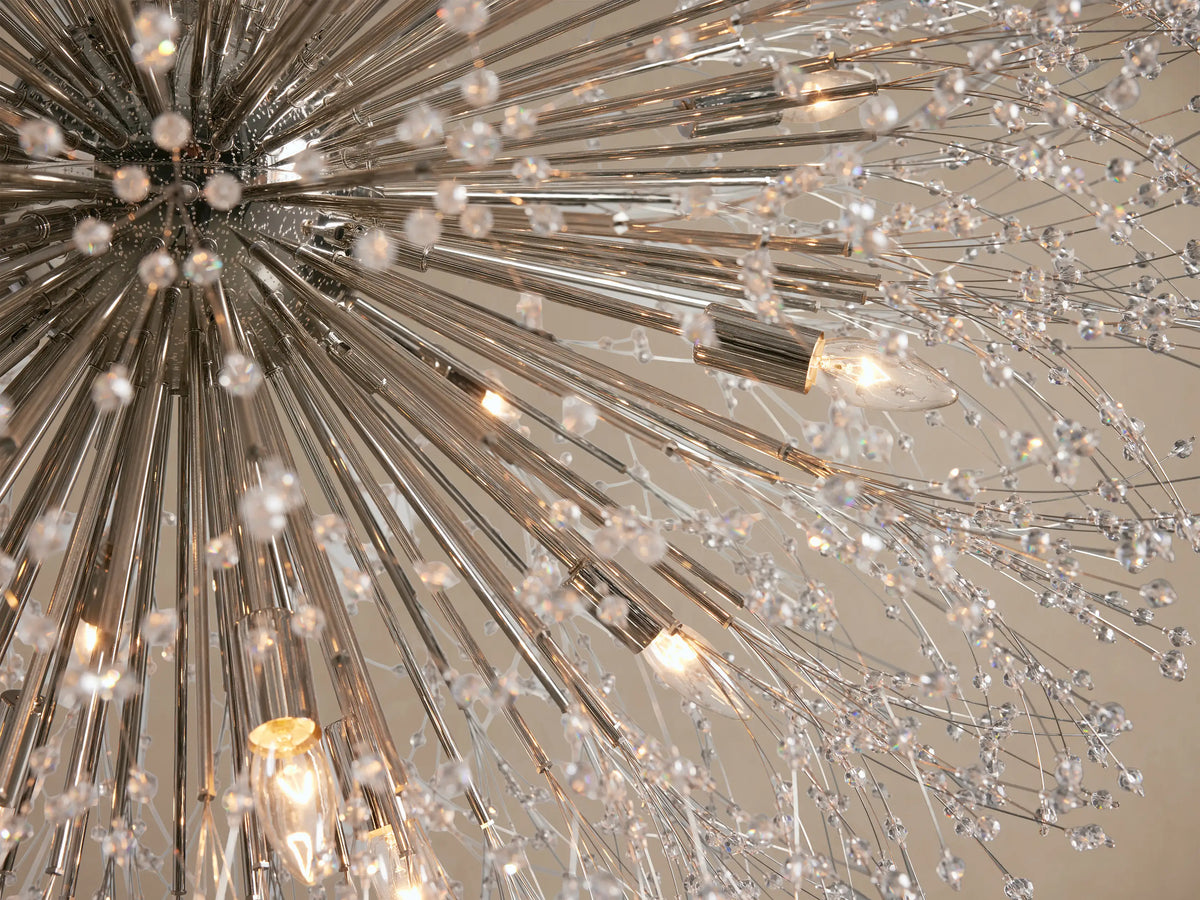 Silver Dandelion Round Chandelier hanging, featuring radiating nickel-plated arms adorned with numerous clear glass crystals.