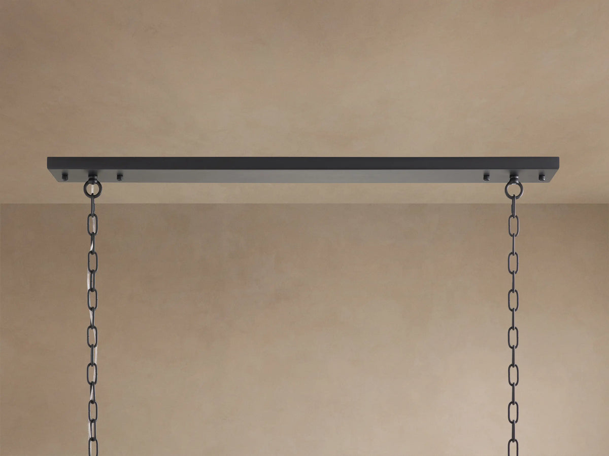 Leyland Rectangular Chandelier: close-up of faceted K9 glass crystals sparkling from a dark, oil-rubbed metal frame.