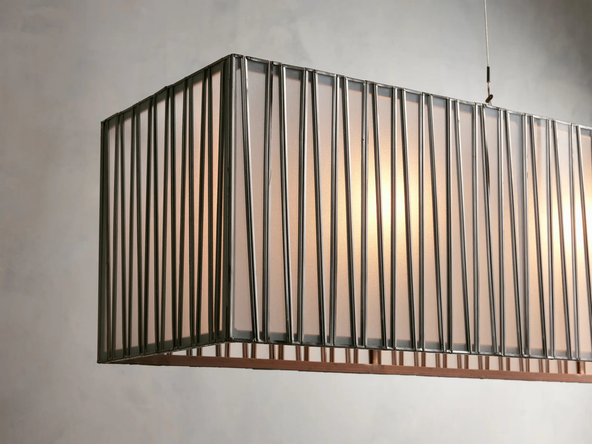 Jeunet Rectangular Chandelier in Nickel. Horizontal grey nickel chandelier, rectangular, with closely-spaced vertical metal bars.