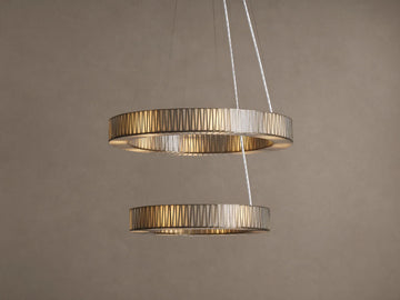 Jeunet 2-Tier Round Chandelier with two illuminated silver-toned circular tiers, featuring a vertical ribbed pattern.