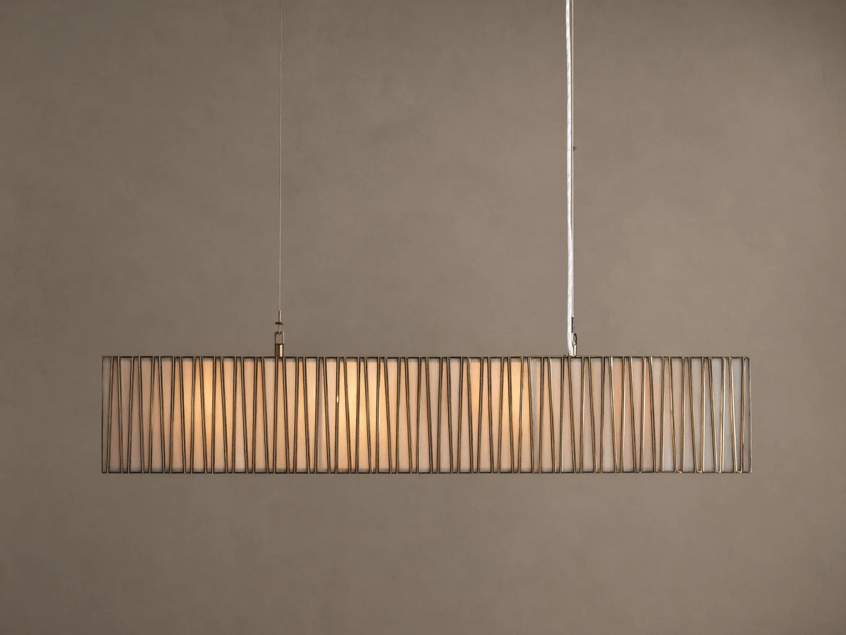 Jeunet Rectangular Chandelier with antiqued brass/nickel frame, vertical bars, and glowing white interior, hanging from ceiling.