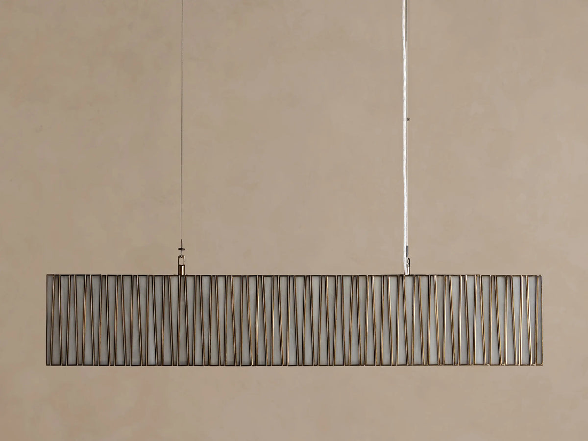 Jeunet Rectangular Chandelier with antiqued brass/nickel frame, vertical bars, and glowing white interior, hanging from ceiling.
