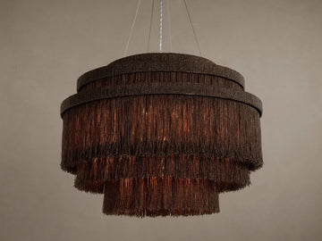 Romilly Tiered Chandelier, dark bronze iron with three tiers of hanging glass beads, warm light glowing from within.