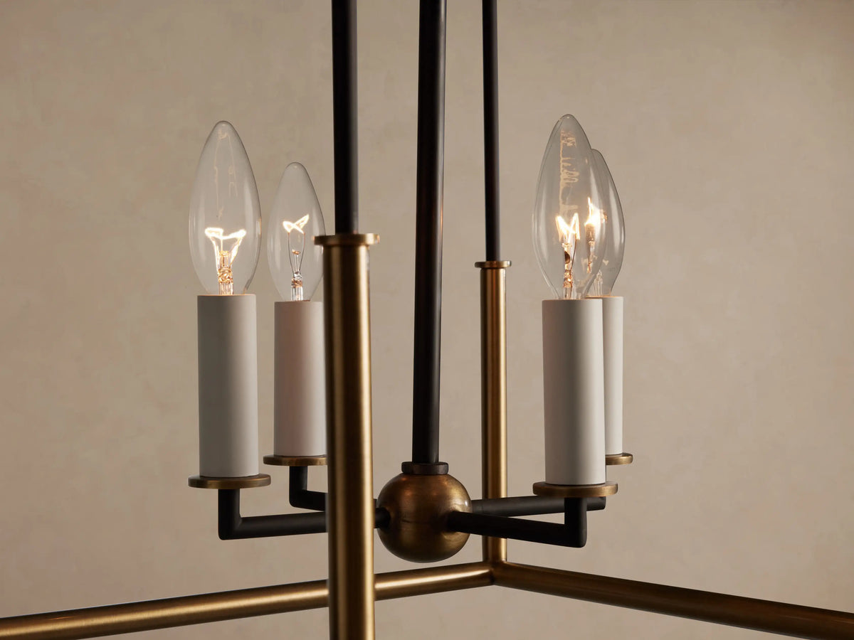 Two-toned Holt Square Pendant with black upper frame, antique brass lower frame, four clear candelabra bulbs.