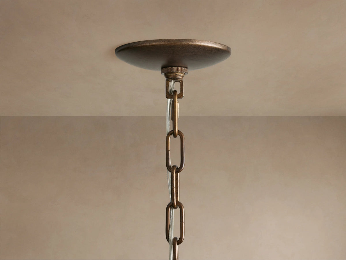 Close-up of Paloma Chandelier's tiered, handwoven rattan shade in natural brown, showing distinct vertical weave texture.