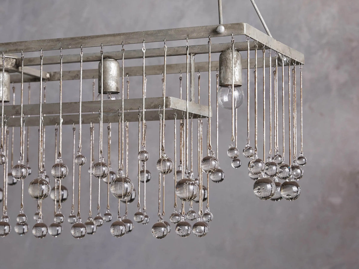 Aubrey Rectangular Chandelier's rustic silver canopy with two metal chains extending downwards, viewed from below.