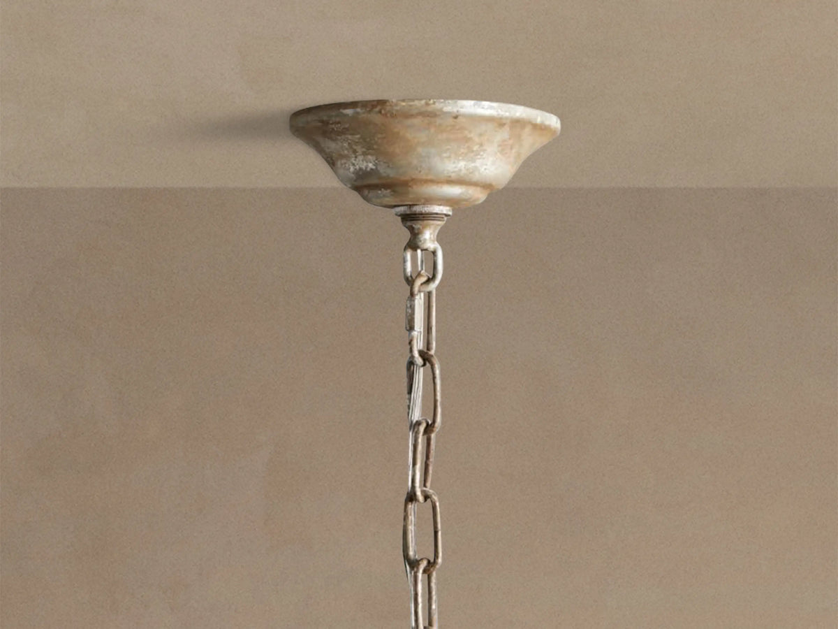 Viticcio Round Chandelier close-up: silver-finished iron branches & leaves with many sparkling clear faceted glass crystals.
