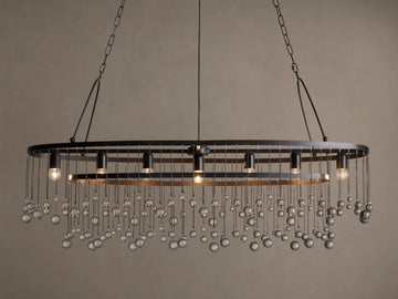 Aubrey Oval Chandelier: Dark iron oval frame with exposed bulbs & numerous hanging clear glass beads.