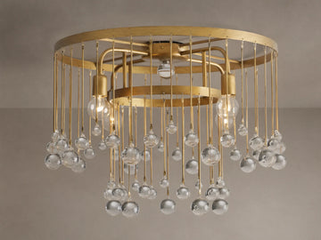 Aubrey Flush Mount light fixture, gold iron frame, dangling clear glass spheres, and visible bulbs, mounted on a ceiling.