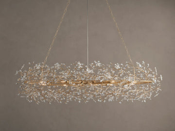 Fiore Oval Chandelier: gold-toned, oval iron frame adorned with myriad sparkling clear crystal leaves, hanging.