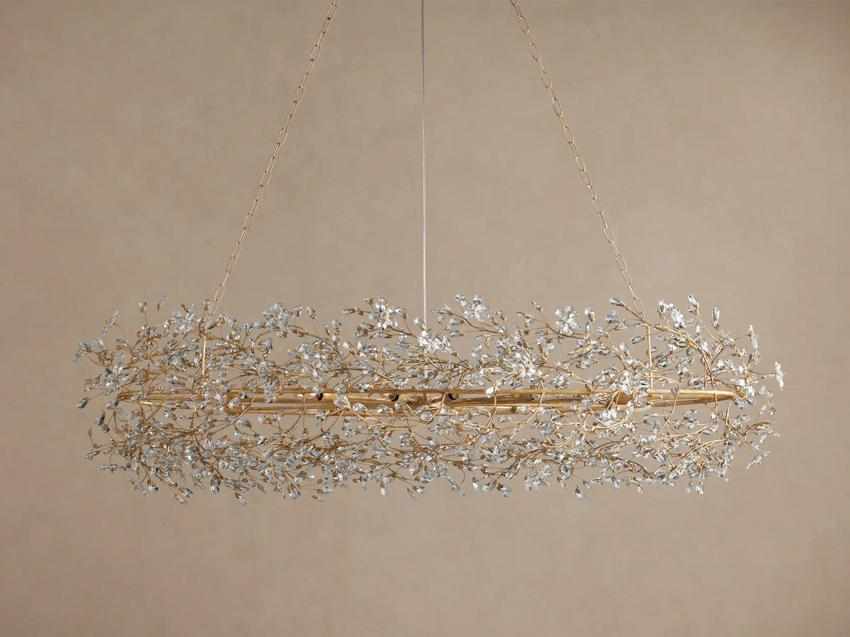 Fiore Oval Chandelier: gold-toned, oval iron frame adorned with myriad sparkling clear crystal leaves, hanging.