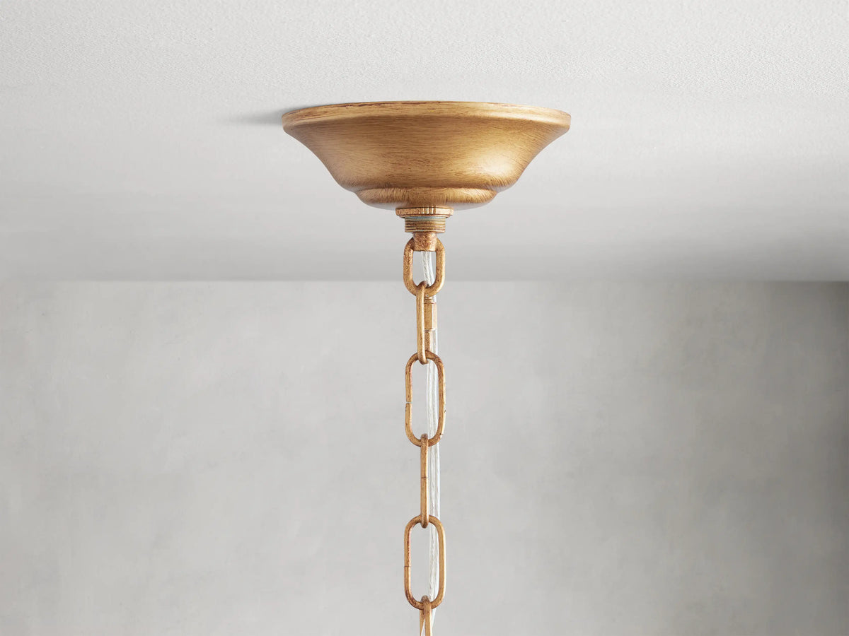 Fiore Crown Chandelier with golden iron branches and amber flower-shaped crystals, elegantly cascading for a luxurious look.