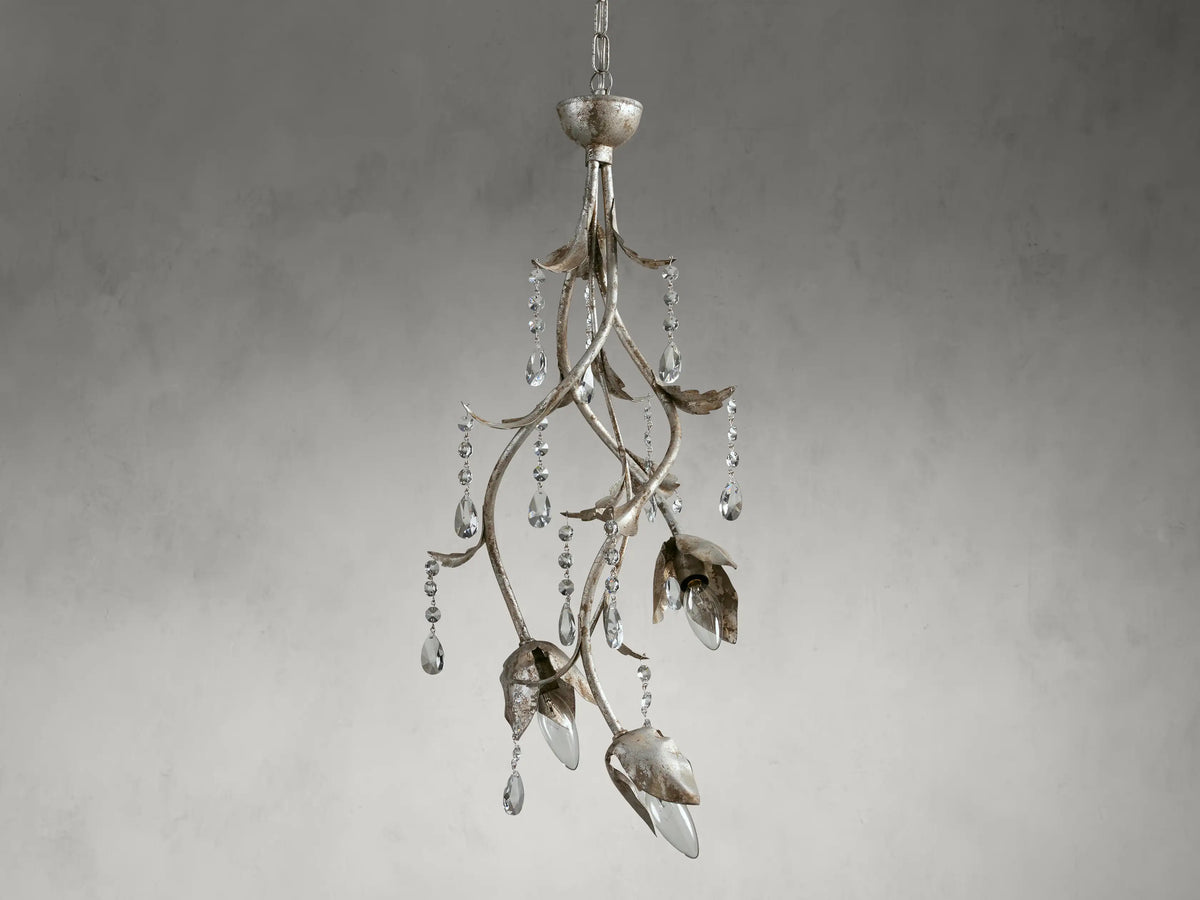 Viticcio Pendant in hand-molded iron with silver finish, adorned with faceted glass crystals and ornate, leaf-shaped bulb holders.