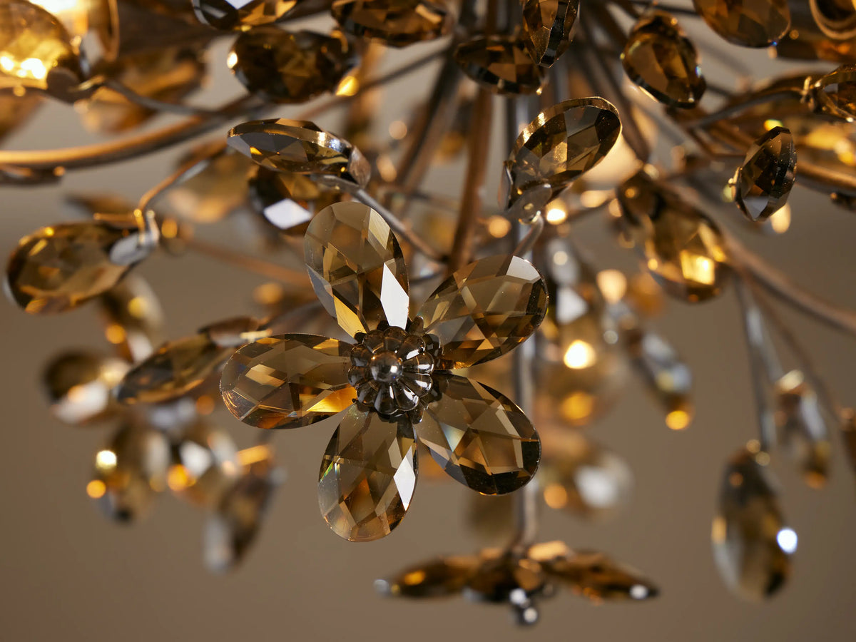 Fiore Flush Mount: Dark bronze iron fixture with numerous smoky brown crystal flowers and buds, mounted on a ceiling.