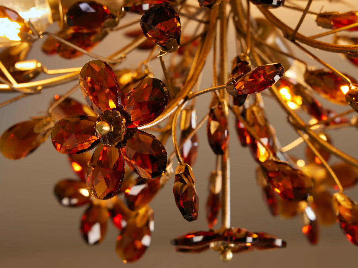 Fiore Flush Mount: gold-toned ceiling fixture adorned with sparkling amber and brown faceted crystal flowers and delicate leaves.